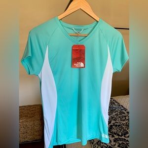 Women’s medium The North Face light weight shirt.